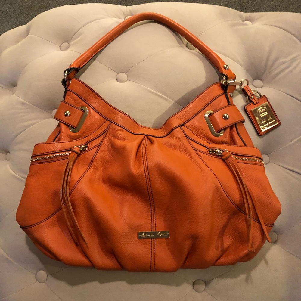 Etienne Aigner leather purse - brunt orange